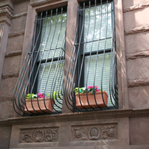 Why Do Some Window Grills Have Curves At The Bottom? The Answer Is Surprising